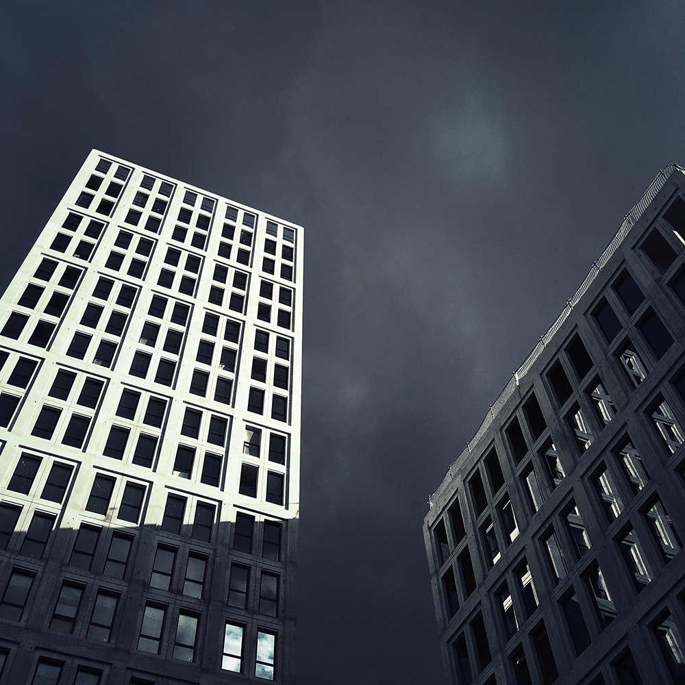Nolistra Strasbourg, a low angle view of a couple of tall buildings